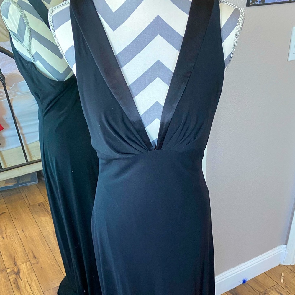 Black formal floor length dress. Plunge neckline
